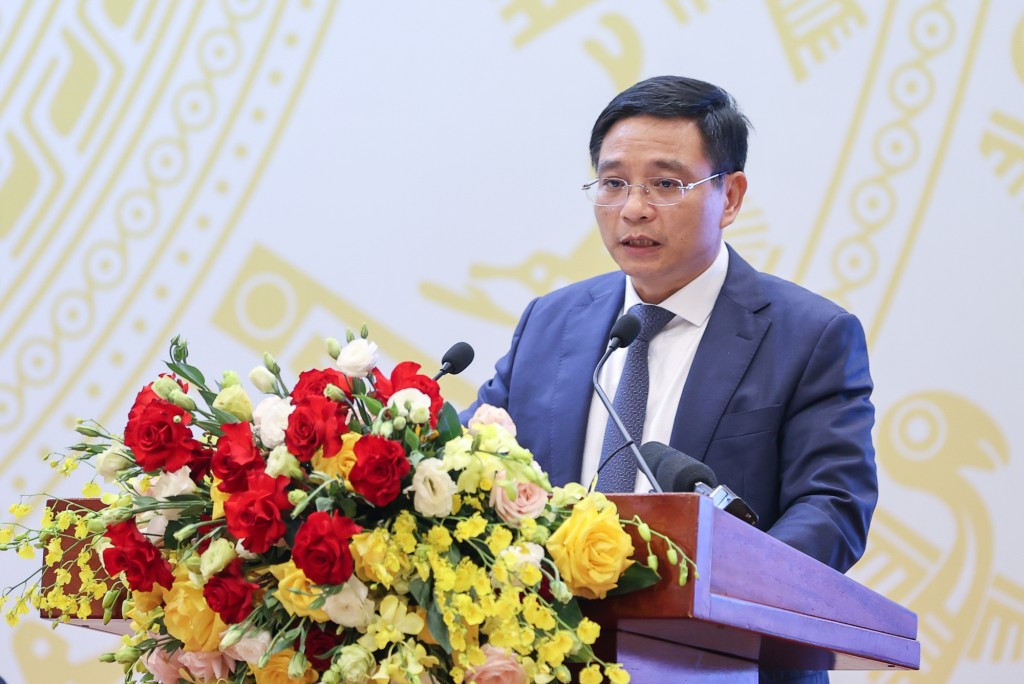 Bộ trưởng Bộ Giao thông vận tải Nguyễn Văn Thắng báo cáo tại Hội nghị - Ảnh: VGP/Nhật Bắc