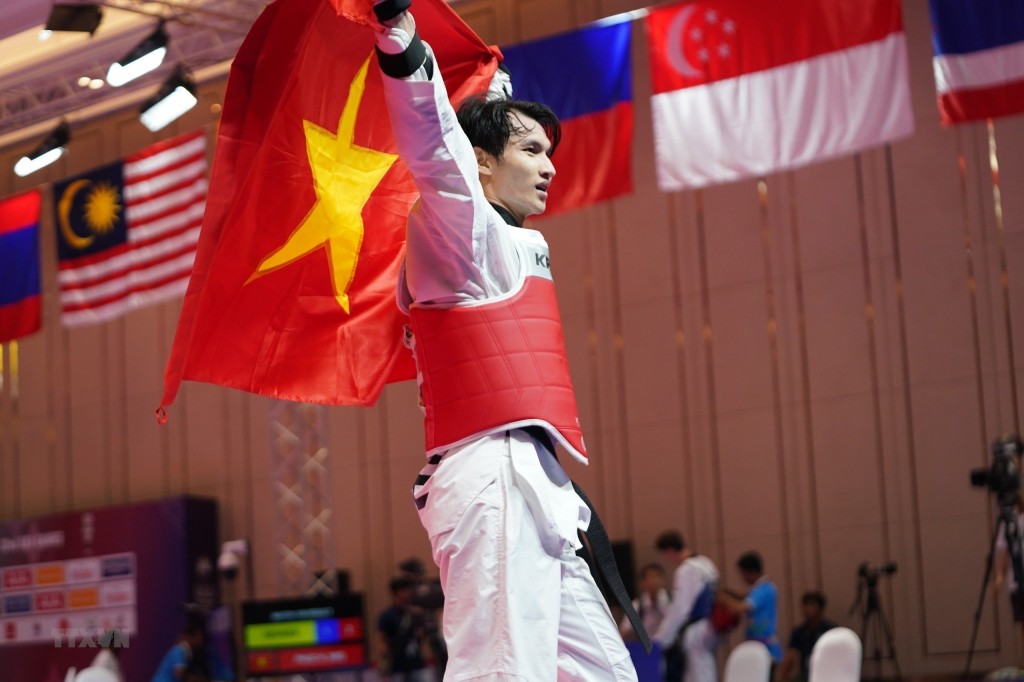 Lý Hồng Phúc giành HCV môn Taekwondo. (Ảnh: TTXVN)