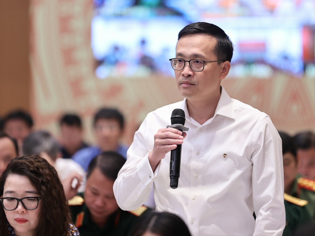 Tổng Giám đốc ngân hàng Vietcombank Phạm Quang Dũng phát biểu tại hội nghị - Ảnh: VGP/Nhật Bắc