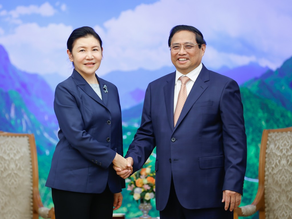 Thủ tướng Phạm Minh Chính tiếp Bộ trưởng Bộ Tư pháp Trung Quốc Hạ Vinh - Ảnh: VGP/Nhật Bắc