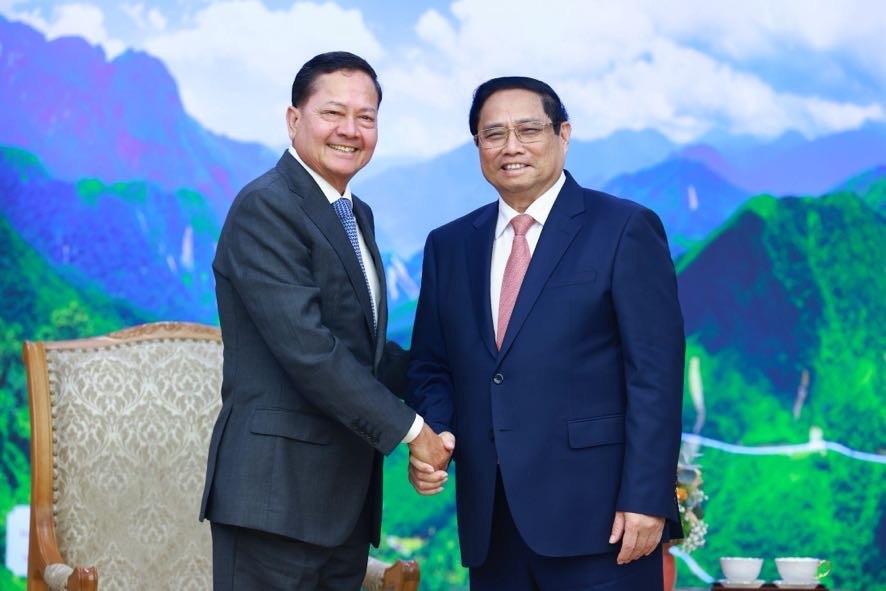 Thủ tướng Chính phủ Phạm Minh Chính và Phó Thủ tướng Campuchia Neth Savoeun - Ảnh: VGP/Nhật Bắc