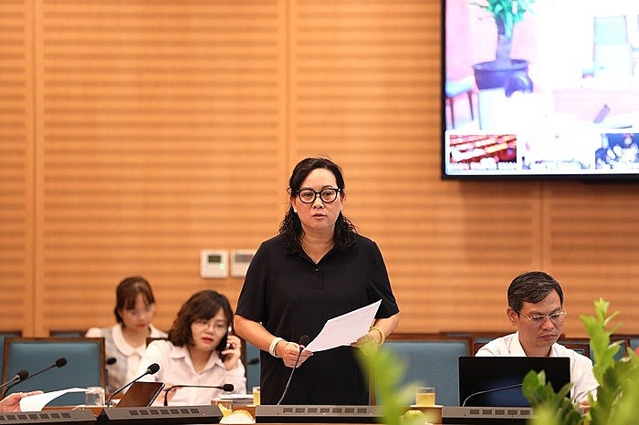 Phó Giám đốc Sở Thông tin và Truyền thông Hà Nội Nguyễn Thị Mai Hương báo cáo tại cuộc họp
