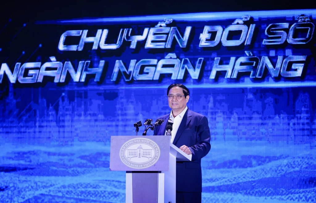 Thủ tướng đánh giá lãnh đạo NHNN Việt Nam đã nhận thức cao và chỉ đạo quyết liệt công tác chuyển đổi số - Ảnh: VGP/Nhật Bắc