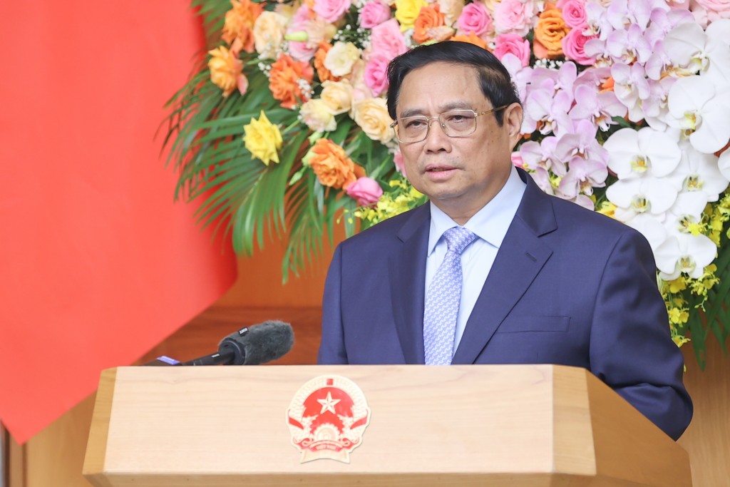 Thủ tướng Phạm Minh Chính chủ trì cuộc tọa đàm với các doanh nghiệp Trung Quốc tiêu biểu trong lĩnh vực phát triển kinh tế xanh, kinh tế số - Ảnh: VGP/Nhật Bắc