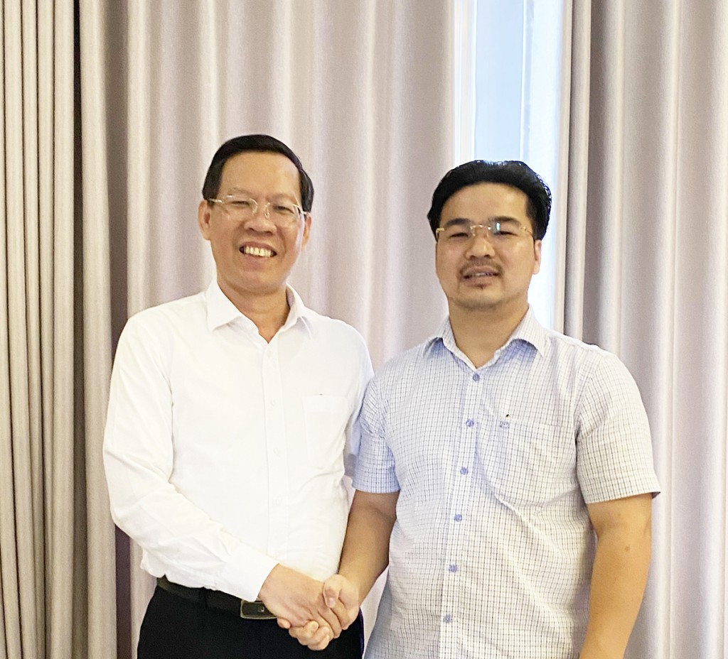 Chủ tịch UBND thành phố Hồ Chí Minh Phan Văn Mãi và ông Mai Vũ Minh