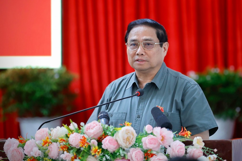 Thủ tướng Phạm Minh Chính nêu rõ, đẩy mạnh tháo gỡ khó khăn cho sản xuất, kinh doanh, tạo công ăn việc làm, sinh kế cho người dân - Ảnh VGP/Nhật Bắc