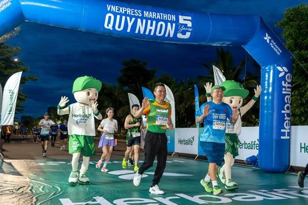 Ông Nguyễn Thành Đạt tham gia tại giải chạy Vnexpress Marathon