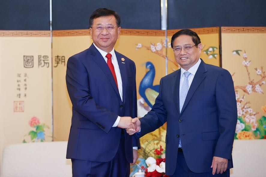 Thủ tướng Phạm Minh Chính tiếp ông Đới Hòa Căn, Chủ tịch Hội đồng quản trị Tập đoàn Xây dựng công trình đường sắt Trung Quốc (CRCC) - Ảnh: VGP/Nhật Bắc