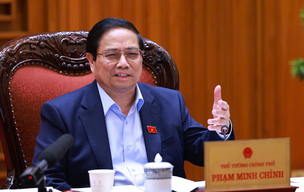 Thủ tướng Phạm Minh Chính nhấn mạnh việc xây dựng Trung tâm tài chính quốc tế tại Việt Nam là hết sức cần thiết, phải quyết tâm thực hiện bằng được - Ảnh: VGP/Nhật Bắc