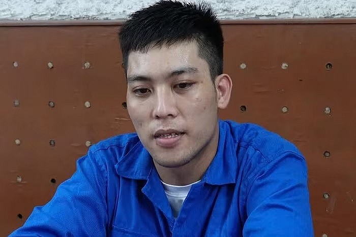 Nguyễn Hữu Tráng tại cơ quan công an.