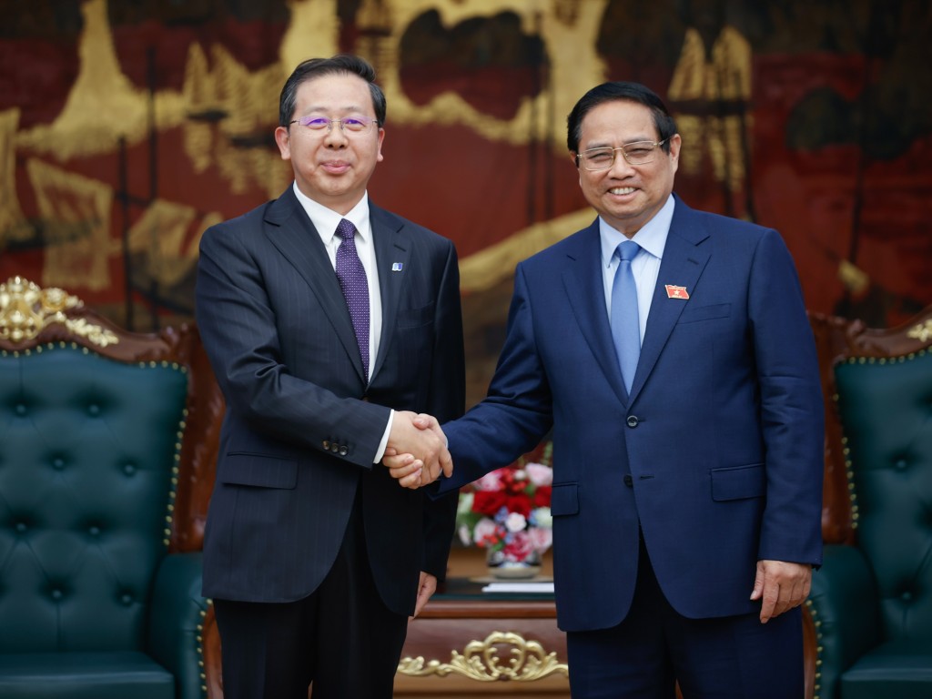 Thủ tướng Phạm Minh Chính tiếp ông Bành Cương Bình, Chủ tịch Hội đồng quản trị Tập đoàn Hoa Điện Trung Quốc - Ảnh: VGP/Nhật Bắc