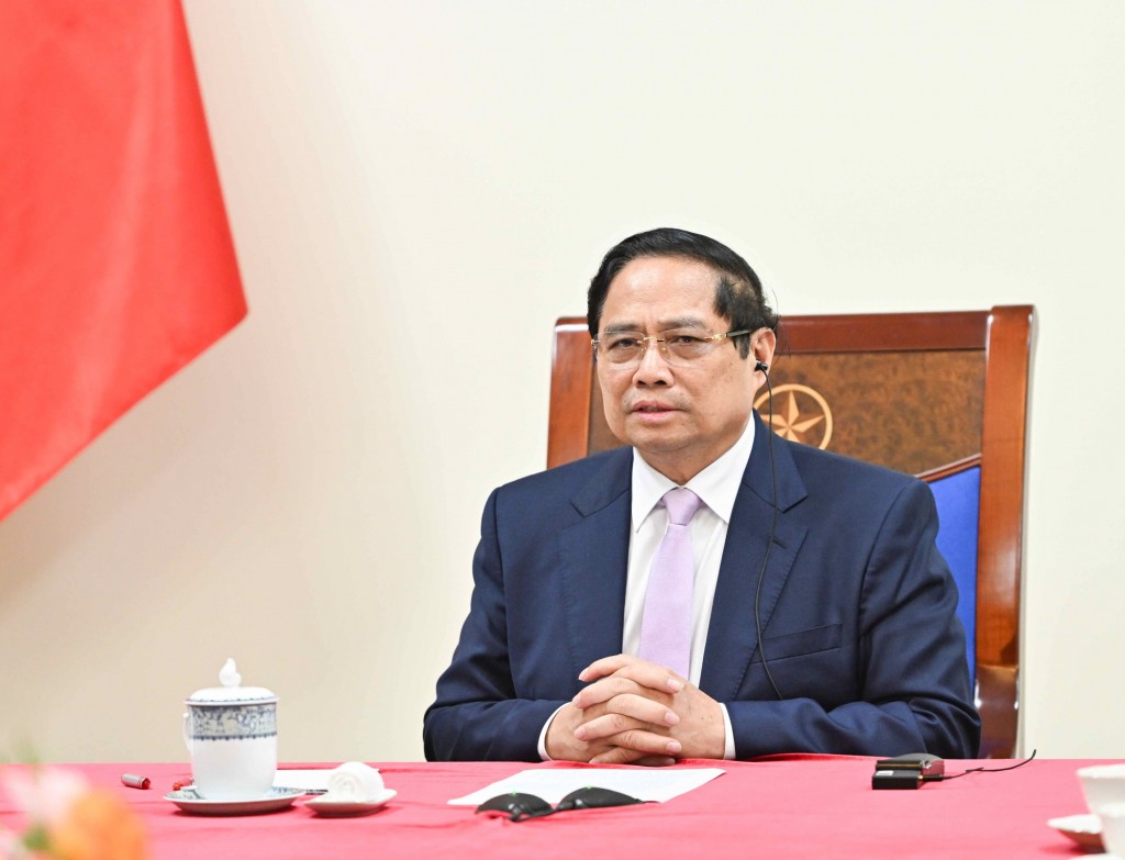 Thủ tướng Phạm Minh Chính điện đàm với Thủ tướng Malaysia Anwar Ibrahim - Ảnh: VGP/Nhật Bắc
