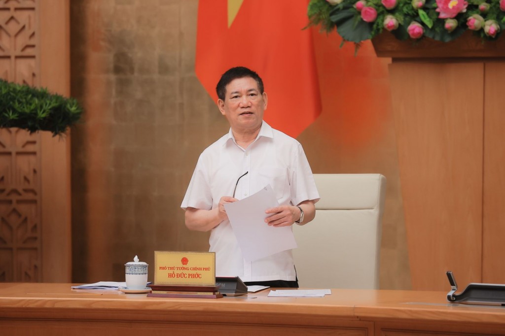 Phó Thủ tướng Chính phủ Hồ Đức Phớc chủ trì cuộc họp Ban Chỉ đạo cơ cấu lại các tổ chức tín dụng và xử lý nợ xấu - Ảnh: VGP/Trần Mạnh