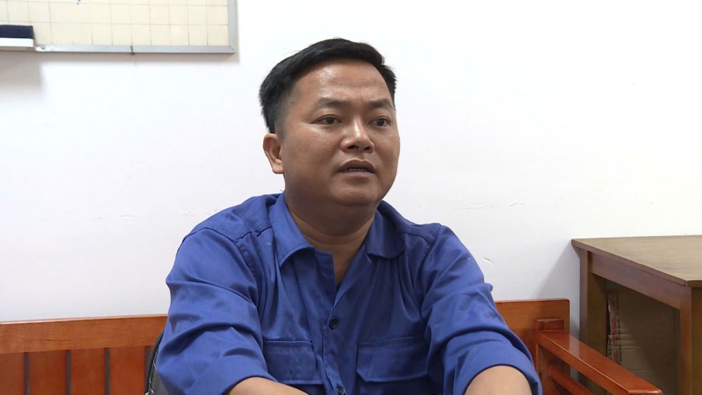 Trần Văn Tuấn tại cơ quan điều tra. Ảnh: CATP
