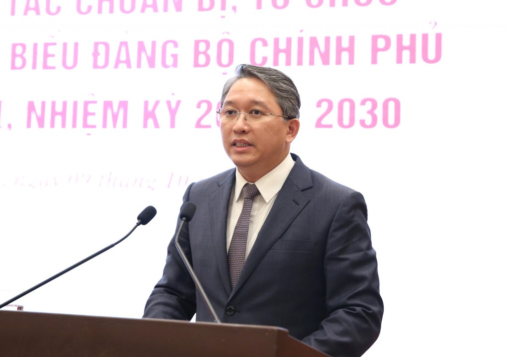 Ủy viên Trung ương Đảng, Bộ trưởng Bộ Tư pháp Nguyễn Hải Ninh trả lời câu hỏi của phóng viên về công tác hoàn thiện thể chế, xây dựng pháp luật - Ảnh: VGP/Nguyễn Hoàng