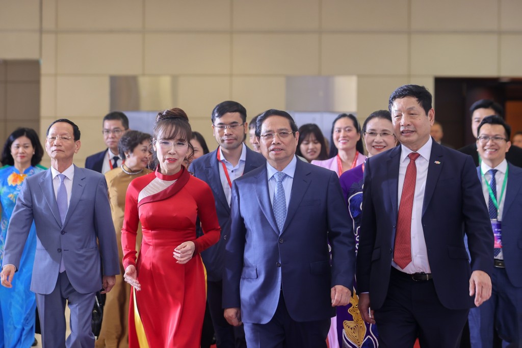 Thủ tướng Chính phủ Phạm Minh Chính tới dự chương trình Mô hình Toàn cảnh Kinh tế tư nhân lần thứ nhất - Ảnh: VGP/Nhật Bắc
