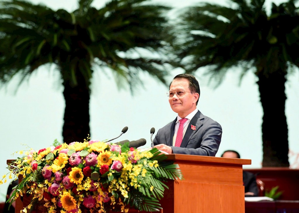 Ủy viên Ban Thường vụ Thành ủy, Chủ nhiệm Ủy ban Kiểm tra Thành ủy Hoàng Trọng Quyết báo cáo kết quả thẩm tra tư cách đại biểu