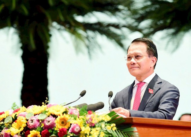 Ủy viên Ban Thường vụ Thành ủy, Chủ nhiệm Ủy ban Kiểm tra Thành ủy Hoàng Trọng Quyết báo cáo kết quả thẩm tra tư cách đại biểu.