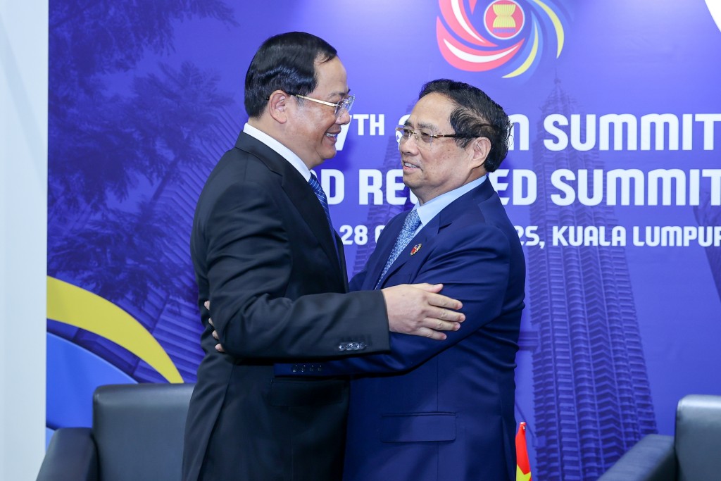 Thủ tướng Chính phủ Phạm Minh Chính gặp Thủ tướng Lào Sonexay Siphandone - Ảnh: VGP/Nhật Bắc