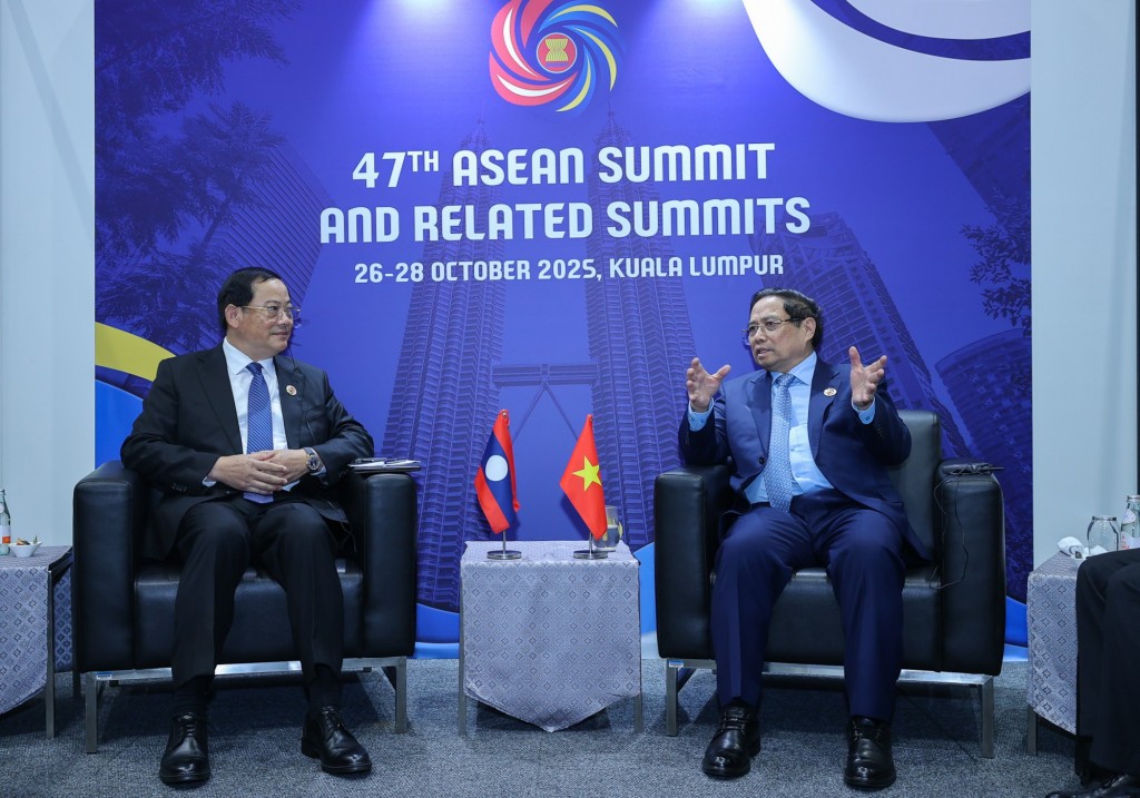 Thủ tướng Chính phủ Phạm Minh Chính khẳng định Việt Nam luôn ủng hộ mạnh mẽ, toàn diện công cuộc đổi mới của Lào - Ảnh: VGP/Nhật Bắc