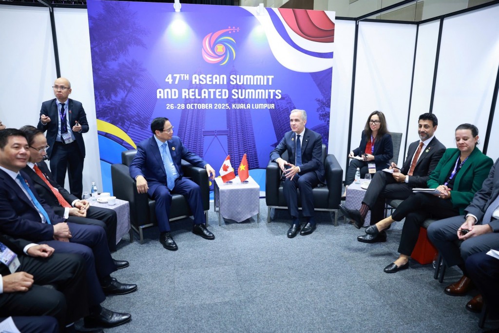 Hai Thủ tướng thảo luận một số biện pháp nhằm đưa hợp tác kinh tế, thương mại, đầu tư trở thành trụ cột hợp tác quan trọng của quan hệ Việt Nam - Canada - Ảnh: VGP/Nhật Bắc