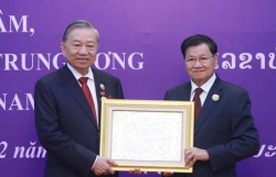 Tổng Bí thư Tô Lâm nhận Huân chương Vàng Quốc gia của Nhà nước Lào