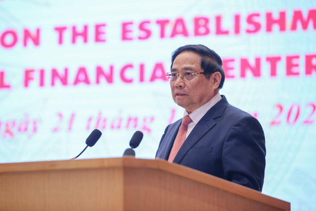 Thủ tướng cho rằng, việc đưa Trung tâm tài chính quốc tế vào hoạt động là sự khởi đầu của một quá trình đổi mới cả về số lượng, chất lượng, hiệu quả đối với sự phát triển thị trường tài chính - Ảnh: VGP/Nhật Bắc