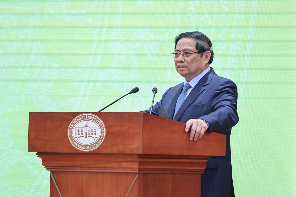 Thủ tướng Phạm Minh Chính ghi nhận, biểu dương NHNN và ngành ngân hàng đã đóng góp quan trọng, tích cực vào kết quả, thành tựu chung của đất nước năm 2025 và cả nhiệm kỳ 2021-2025 - Ảnh: VGP/Nhật Bắc