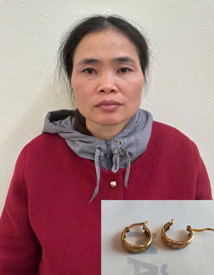 Đối tượng Đinh Thị Kim cùng tang vật của vụ án