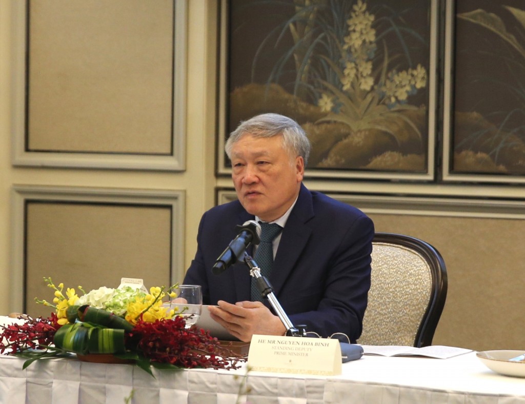 Phó Thủ tướng Thường trực Nguyễn Hòa Bình tham dự Tọa đàm gặp gỡ các doanh nghiệp, nhà đầu tư Singapore - Ảnh: VGP/Nguyễn Hoàng