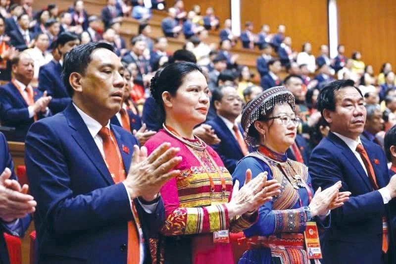 Các đại biểu tham dự Phiên khai mạc Đại hội đại biểu toàn quốc lần thứ XIV của Đảng