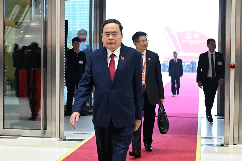 Đồng chí Trần Thanh Mẫn, Ủy viên Bộ Chính trị, Chủ tịch Quốc hội và đồng chí Nguyễn Huy Tiến, Viện trưởng VKSND tối cao tham dự Đại hội đại biểu toàn quốc lần thứ XIV của Đảng. Ảnh: TTXVN