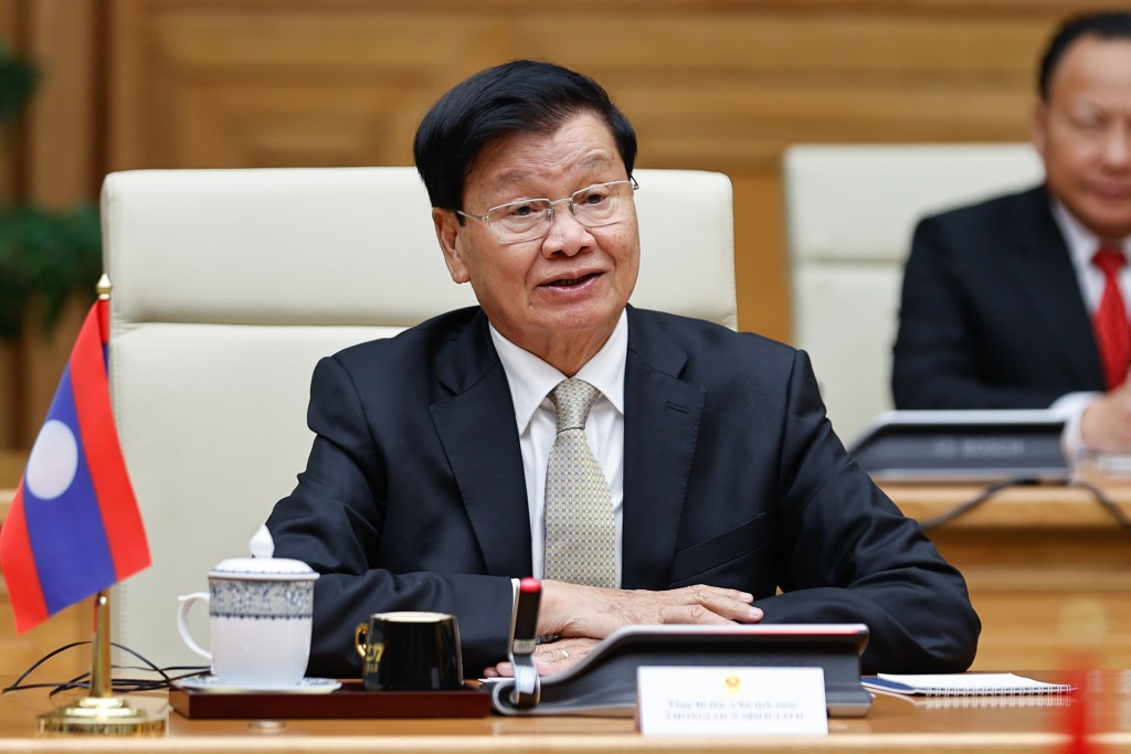 Tổng Bí thư, Chủ tịch nước Lào Thongloun Sisoulith đánh giá cao vai trò chỉ đạo, điều hành quyết liệt, hiệu quả của Chính phủ Việt Nam, đứng đầu là Thủ tướng Chính phủ Phạm Minh Chính - Ảnh: VGP/Nhật Bắc