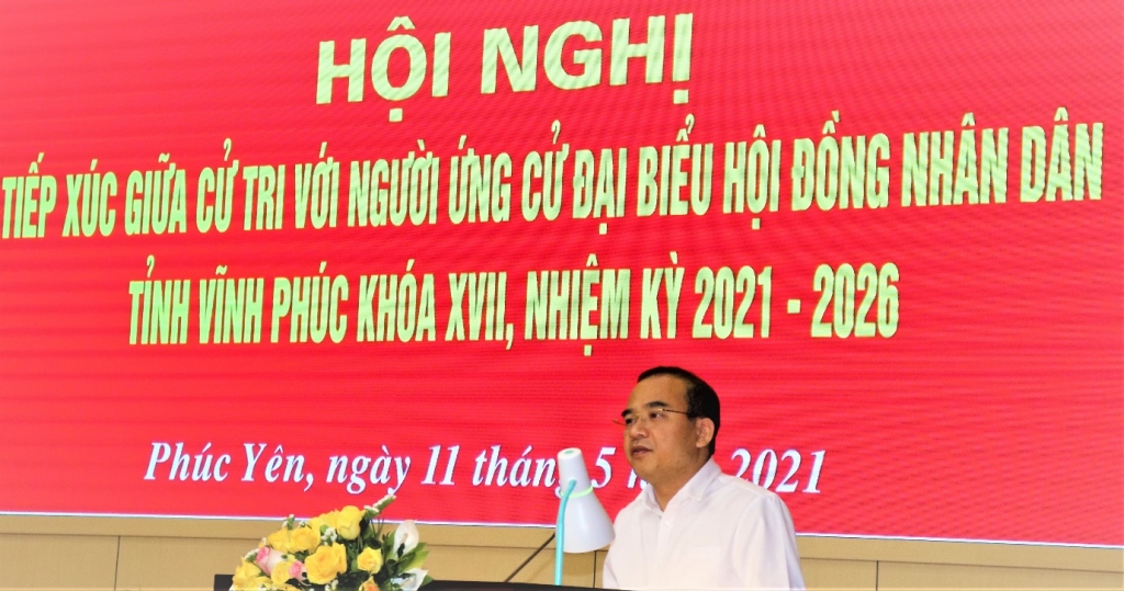 Ông Phan Tiến Dũng, Phó bí thư thành ủy,  chủ tịch UBND thành phố thông qua chương trình hành động tại hội nghị