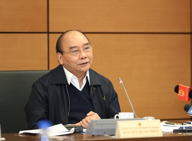 Chủ tịch nước Nguyễn Xuân Phúc thảo luận tại tổ