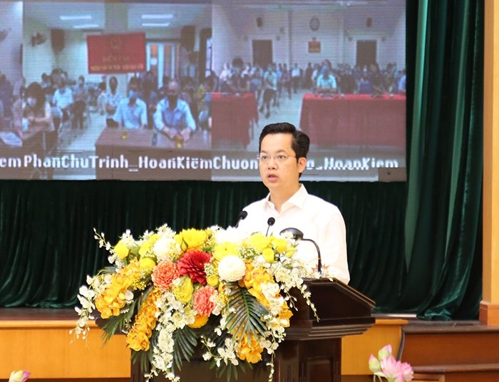 Bí thư Quận ủy Hoàn Kiếm Vũ Đăng Định trình bày chương trình hành động tại hội nghị