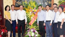 Bí thư Thành ủy Hà Nội Đinh Tiến Dũng thăm, chúc mừng Báo Nhân Dân
