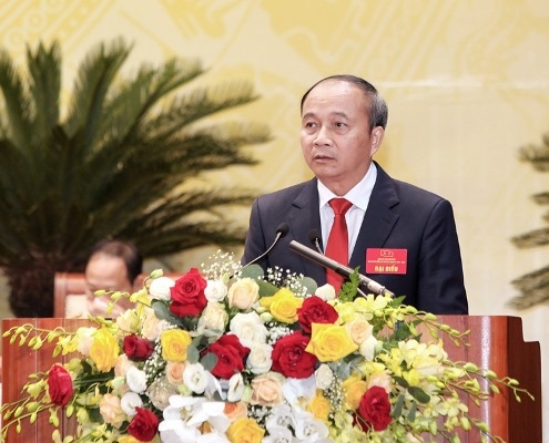 Ông Nguyễn Văn Trì, Phó Bí thư Tỉnh ủy, Chủ tịch UBND tỉnh trình bày dự thảo Báo cáo chính trị của Ban Chấp hành Đảng bộ tỉnh trình đại hội.