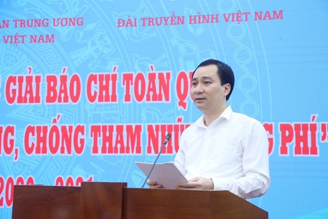 Ông Vũ Văn Tiến, Trưởng Ban Tuyên giáo cơ quan UBTƯ MTTQ Việt Nam, Phó Trưởng Ban Tổ chức giải phát biểu tại cuộc họp.