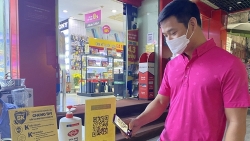 Quét mã QR: Nơi nghiêm túc, chỗ thờ ơ