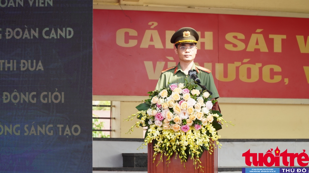 Thiếu tá Phạm Mạnh Tường, Phó Chủ tịch Công đoàn CAND báo cáo tổng kết hoạt động Tháng Công nhân, Tháng hành động VSATLĐ, Tháng hành động vì môi trường năm 2020 của Công đoàn CAND