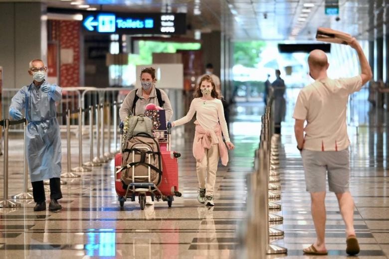 Hành khách tại sân bay quốc tế Changi ở Singapore (Ảnh: Straitstimes)