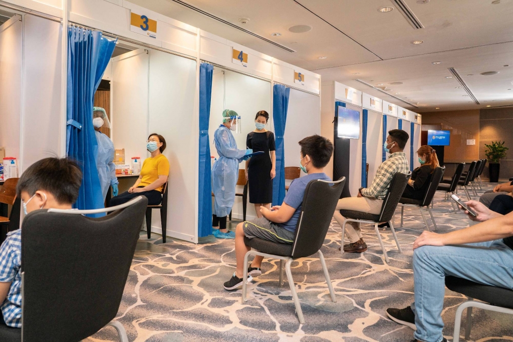 Singapore điều trị Covid-19 theo hướng như bệnh cúm mùa (Ảnh: Fullerton Health)