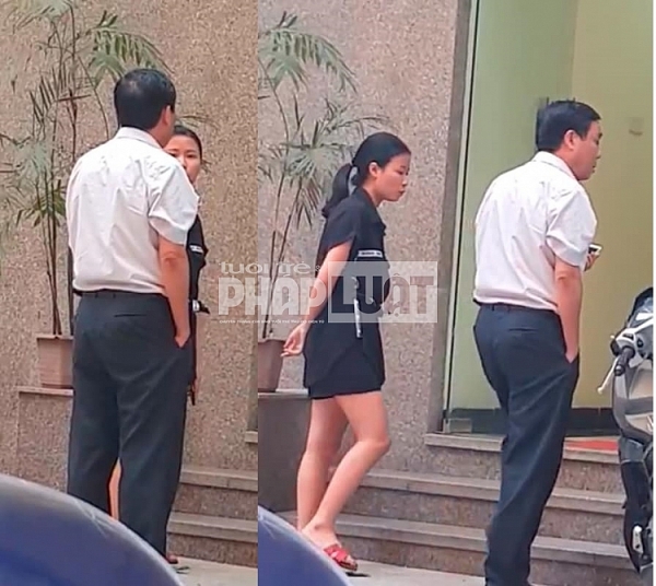 Người đàn ông trao đổi với nhân viên Viện Thẩm mỹ Gangnam K - Beauty trước khi bước vào trụ sở Công an phường