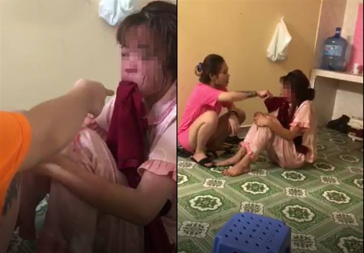 Nạn nhân bị nhóm đối tượng hành hạ, nhét giẻ vào miệng (ảnh cắt từ clip)